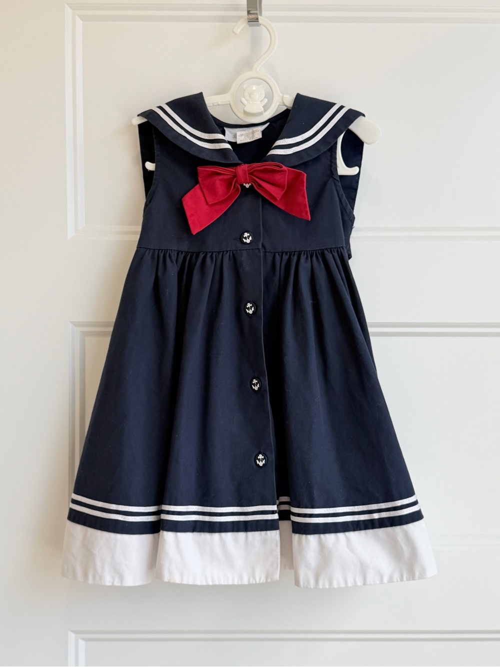 Navy Sailor-Inspired Girls Dress with Red Bow